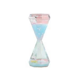 Cute liquid motion bubble timer hourglass ornament with floating cat and cherry blossoms.
