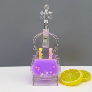 Kristallen viool vloeibaar speelgoed, paarse oliedruppel ornament met schattige zeemeerminnen.