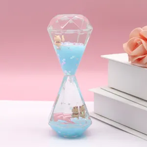 Liquid diamond hourglass oil drop timer with cute little bear decoration for desk decor gift.