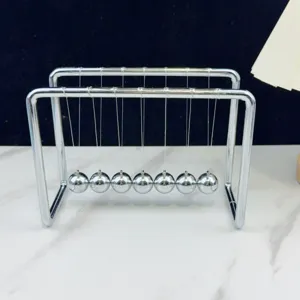 Cuna de Newton de metal con siete bolas péndulo de equilibrio decoración de escritorio