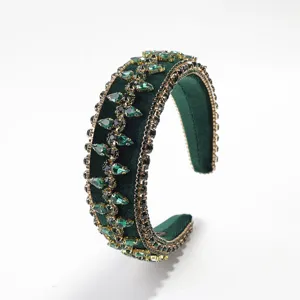 Green velvet baroque crystal rhinestone headband detail close-up view accessory fashion.