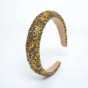 Close-up of the sparkling glitter sequin star headband, showing fine texture and star details.