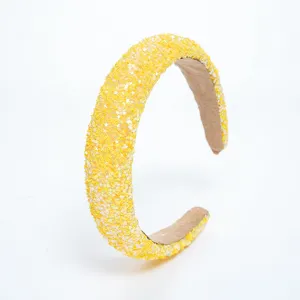 Yellow sequin star headband detail view, sparkling glitter hair accessory for women and girls.