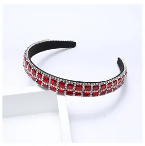 Rhinestone hair hoop detail, sparkling red crystal narrow headband, elegant hair accessory.