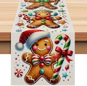 Camino de mesa navideño con adorable hombre de jengibre y bastón de caramelo festivo.