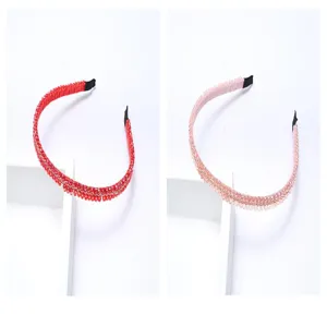 Detailed view of crystal rhinestone hair hoops, simple non-slip women hair accessories.