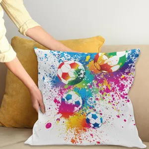 Decorative soccer pillow cover with colorful paint splatter design for modern living room sofa.