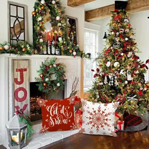 Cozy Christmas throw pillow scene featuring festive red and white snowflake designs for home.