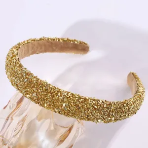 Détail de serre-tête pailleté or, accessoire de cheveux de luxe pour femmes, élégant chic.