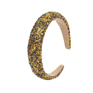 Sparkling gold and black glitter star headband for women, fashion hair accessory main view.