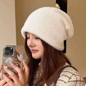 Fluffy warm winter beanie hat for women, soft plush windproof knit cap for outdoor daily wear.