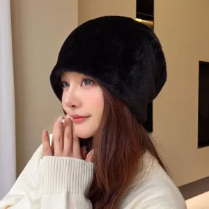 Black plush winter hat for women, warm fuzzy beanie cap, cozy outdoor cold weather headwear.