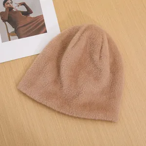 Plush warm winter beanie hat for women, soft knitted windproof cap for outdoor daily wear.
