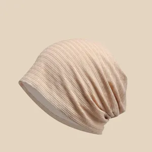 Detail view of breathable knit slouchy beanie hat for women, soft spring summer head wrap