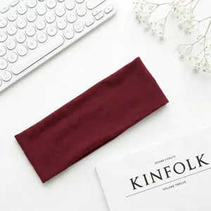 Fascia elastica in tinta unita rosso vino da donna, fascia per capelli sportiva yoga minimalista.