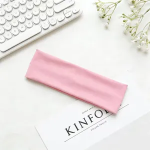 Fascia per capelli sportiva elastica rosa da donna, fascia assorbente tinta unita per yoga.