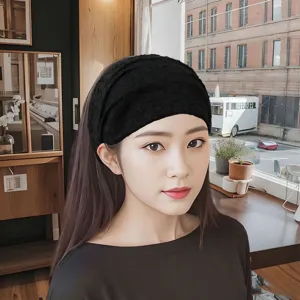 Elegante fascia larga nera da donna, accessorio per capelli con motivo floreale per uso quotidiano.