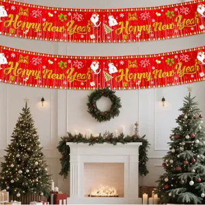 Detail view of red foil fringe curtain with Happy New Year text and cute Christmas elements.