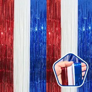 Close-up detail of red white and blue tinsel curtain, perfect party background decoration.