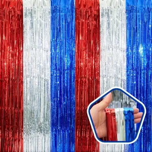 Red silver blue tinsel fringe curtain for party background and holiday celebration decor.