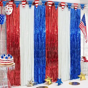 Detailed scene of red white and blue tinsel fringe curtain for holiday party background decoration.