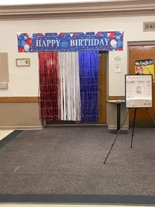 Scene detail of red white and blue tinsel fringe curtain for party decoration background