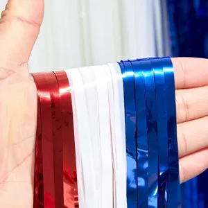 Red white and blue foil fringe curtains for party background decoration and door curtain display.