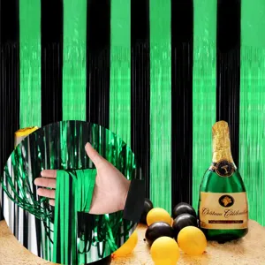 Black and green foil fringe curtain for Halloween party decoration and metallic background.