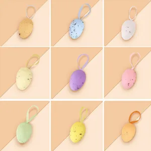 Colorful speckled Easter egg ornaments with hanging loops for festive spring home decor.