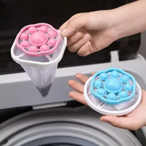 Sac filtrant flottant en filet pour lave-linge, attrape-cheveux et peluches pratique.