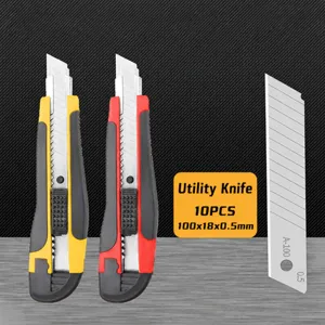 Detail view of rubber-coated utility knife and replacement blade set, precision cutting tool.