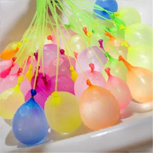 Quick fill water balloons set detail shot showing multiple colorful balloons filling up in sink.