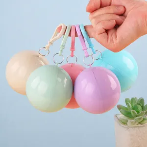 Imperméable Balle Jetable Portable Imperméable Léger Couleur Macaron Voyage En Plein Air Équipement De Pluie D'urgence Avec Crochet