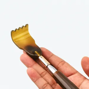 Retractable back scratcher with smooth horn claw and metal handle for comfortable use.