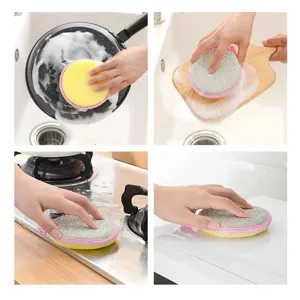Detail view showing the double-sided cleaning sponge effectively scrubbing pans, boards, and stoves.