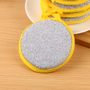 Round double-sided cleaning sponge scouring pad with yellow edge for kitchen dishwashing.