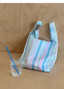 Mini foldable striped shopping bag, waterproof portable handbag for daily outdoor use.