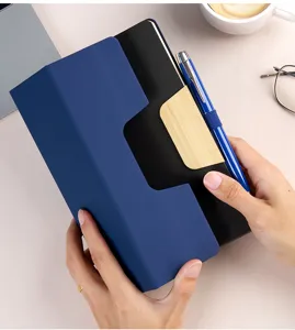 A5 business notebook with unique blue cover and pen, perfect for corporate custom branding.