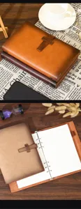 Retro loose-leaf leather notebook journal with soft cover, perfect for daily notes and planning.