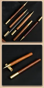 Close-up detail of luxury wooden and brass gel pen, showing fine metallic nib and wood grain.