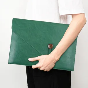Green leather document folder A4 envelope bag with wooden button and string closure.