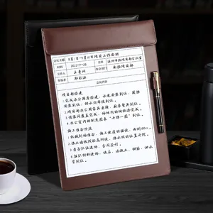 Premium leather conference folder and clipboard with magnetic closure and pen holder for business office.