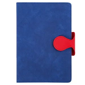 Blue leather hardcover notebook with red strap closure for office and school daily journaling.