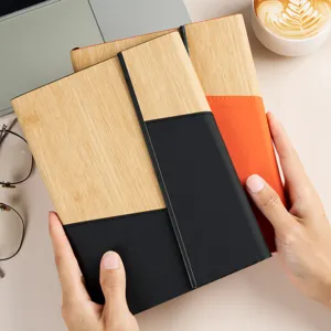 A5 trifold notebook with wood grain and PU leather splicing for business and office use.