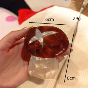 Mushroom hair claw clip detail view, cute acetate hair accessory for daily styling and updos.