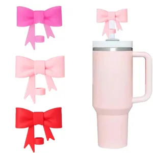 Capuchon de paille en silicone nœud pour pailles 10mm, accessoire de tasse rose et rouge.