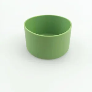 Green silicone cup boot detail view, anti-slip protective sleeve for water bottle.