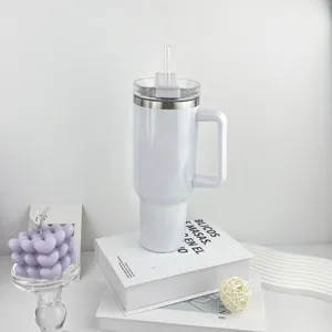 Large capacity stainless steel insulated travel tumbler with comfortable handle and straw.