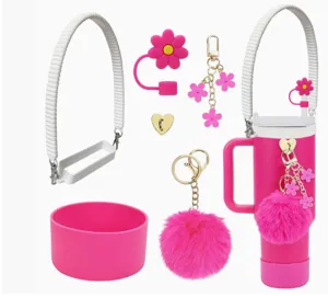 Stanley tumbler accessory set pink silicone boot strap pom pom keychain straw cover