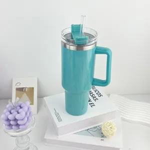 40oz stainless steel insulated tumbler with handle and straw for travel and sports.